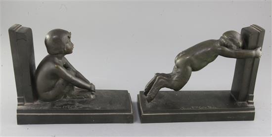 Paul Silvestre (French 1884-1976). A pair of early 20th century patinated bronze bookends, Susse Freres, Paris, length 8.25in.